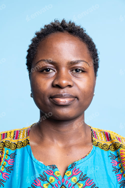 Preview: Portrait of african american girl wearing traditional clothes on camera
