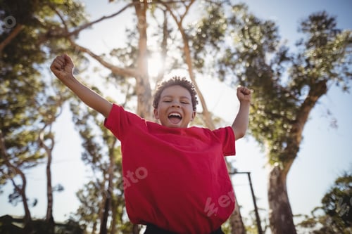 Preview: Boy cheering during obstacle course
