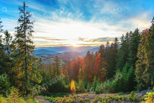 Preview: Morning sun illuminating rolling hills with light rays