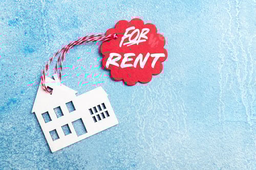 Preview: House for rent label on christmas holidays. Wooden house symbol with rent tag on blue background
