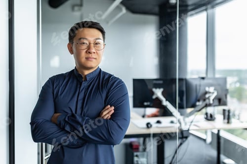 Preview: Portrait of businessman with arms crossed, asian man smiling and looking at camera, man working