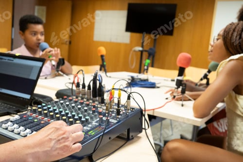 Preview: African kids creating podcast in a broadcasting studio