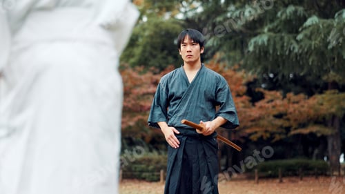 Preview: Sword, martial arts and man in outdoor training with culture, fight coaching or samurai challenge i
