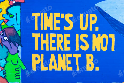 Preview: Message in defense of the environment and against climate change painted on a wall.