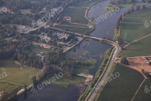 Preview: Aerial view of homes and farm fields in Fraser Valley