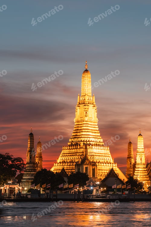 Preview: Wat Arun Temple during Sunset at Chao Praya River Bangkok, Thailand.