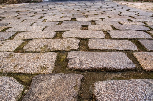 Preview: Stone paving stones close-up, European stone road