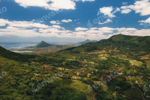 Preview: Bird's-eye view of the mountains and fields of the island of Mauritius.Landscapes Of Mauritius