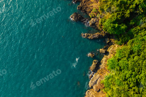 Preview: Beautiful golden light over the coast of Ko Chang island at sunrise. Tropical beach aerial view.