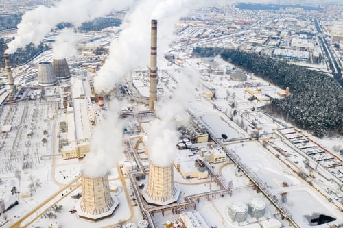 Preview: Thermal power plant in winter in the city of Minsk. Smoke is coming from the big Chimneys