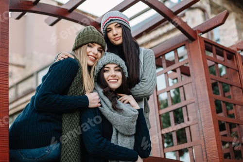 Preview: Three beautiful young girls posing against the backdrop of the park