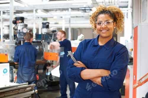 Preview: Portrait of female student in workshop at college