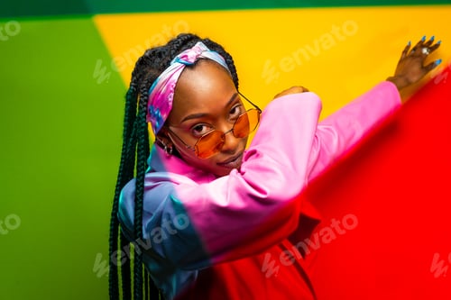 Preview: Beautiful afro woman with pigtails and stylish clothes