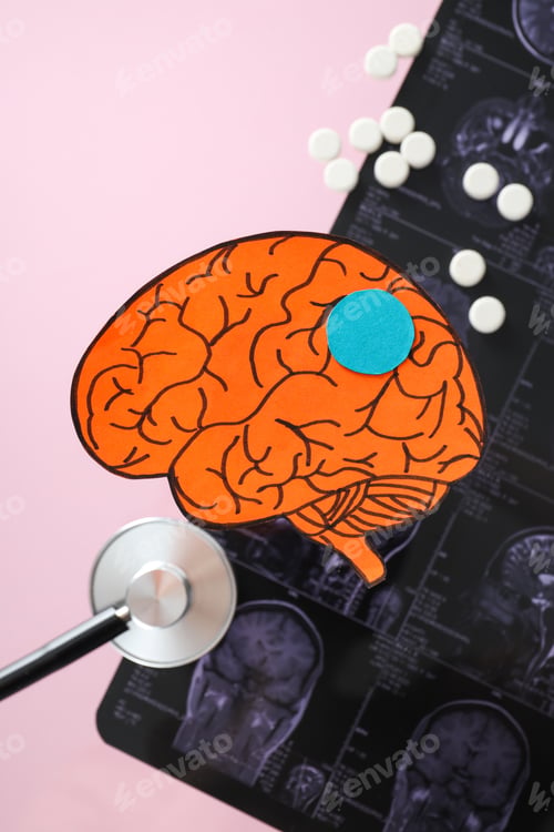 Preview: Paper human brain with stethoscope and MRI image in the background
