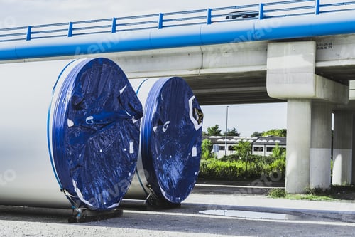 Preview: Closeup of two huge wind turbine parts in the storage