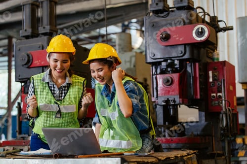 Preview: Female engineer workers celebrating for complete project