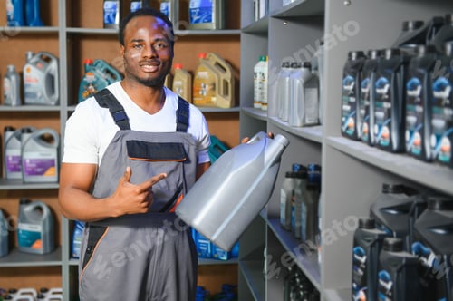 Preview: Smiling african Salesman Auto Parts Store