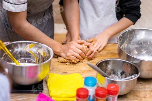 Preview: Christmas cookie workshops. Children kneading cookies.