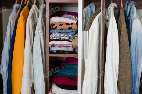 Preview: Organized Closet Displaying Hanging and Folded Clothes