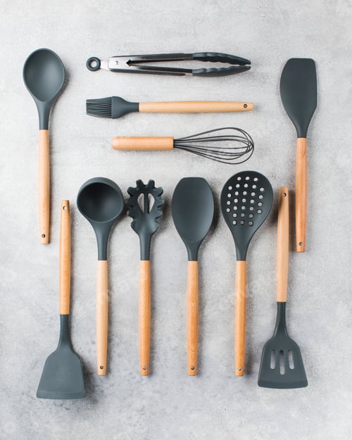 Preview: Set of kitchen utensils on a gray background.