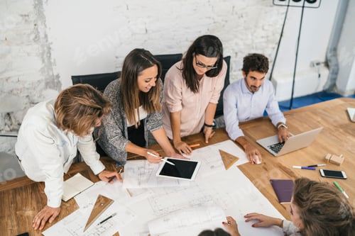 Preview: Young team of coworkers making great work discussion in modern c