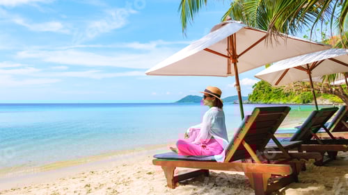 Preview: Asian woman on a beach chair on the beach of Koh Samet Island Rayong Thailand