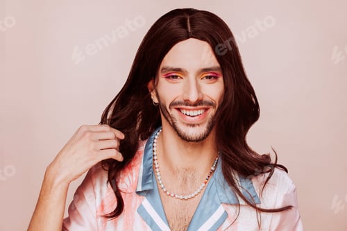 Preview: Drag queen wearing makeup and wig posing at studio