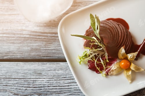 Preview: Cooked pear on white plate