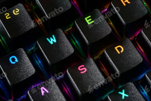 Preview: Macro closeup of a backlit RGB gaming keyboard.