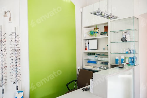 Preview: Ophthalmologist's workplace with spectacle frame and other work equipment