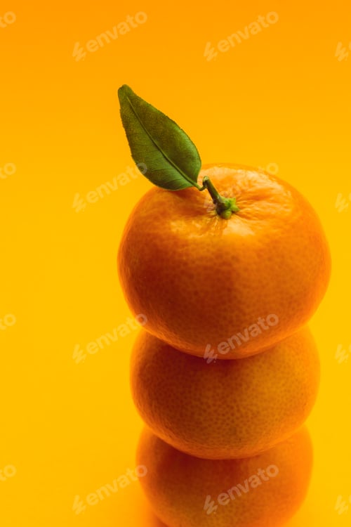 Preview: tangerines with orange background