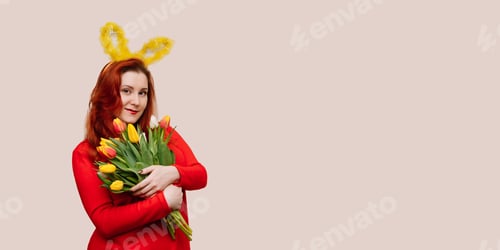 Preview: Woman with Easter Bunny Ears Holding Yellow Tulips