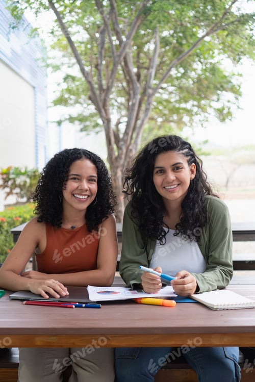 Preview: University students studying together on campus