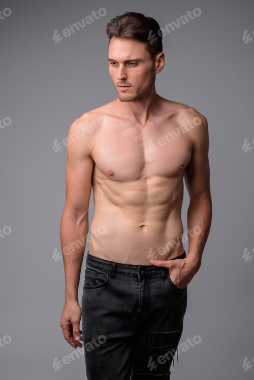 Preview: Studio shot of handsome muscular man shirtless