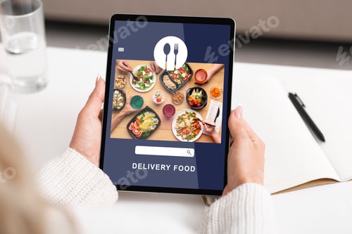 Preview: Food delivery to office or home during covid-19 outbreak. Woman use tablet