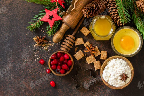 Preview: Baking winter. Ingredients for Christmas baking - cocoa, cranberries, spices, nuts, flour and eggs.