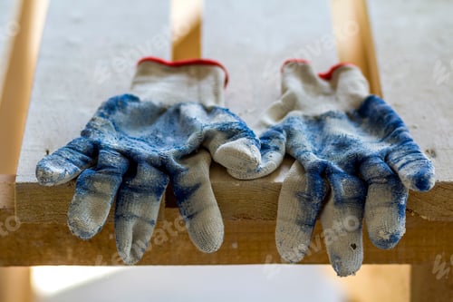 Preview: Used old dirty torn worker's gloves as a metaphor, concept or symbol for the end of the work season