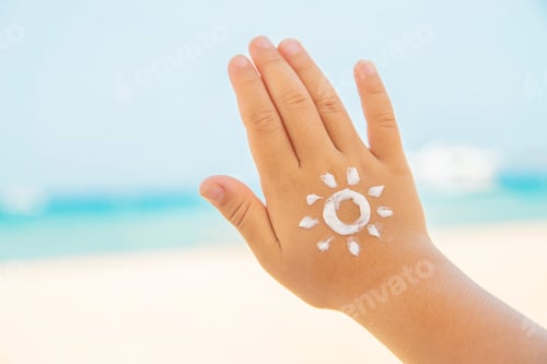 Preview: Sunscreen on the skin of a child. Selective focus.