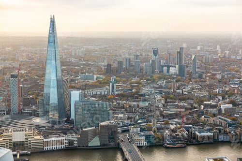 Preview: London skyline featuring skyscrapers and river Thames on a cloudy day