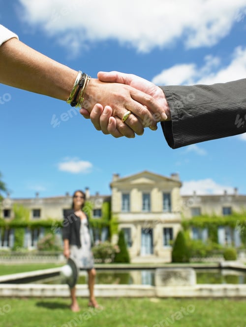 Preview: People shaking hands after a sale