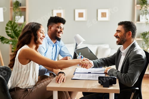 Preview: Young couple makes a deal with an agent in the office and does handshake