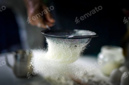 Preview: Chef preparing food in kitchen.