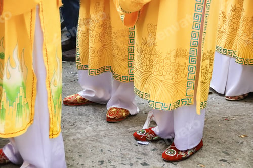Preview: Group of Indians wearing yellow lungi clothing