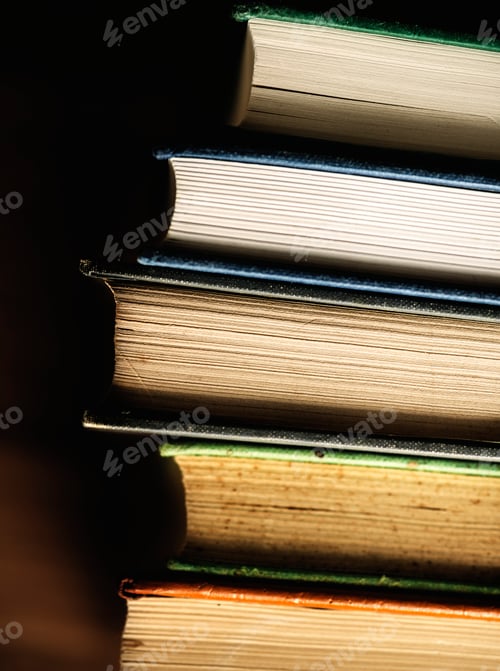 Preview: Closeup of stack of antique books educational, academic and literary concept
