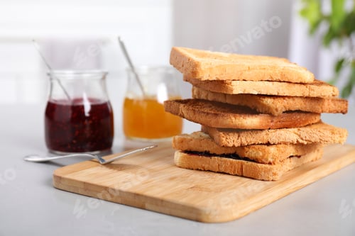 Preview: Toasts and jams for breakfast on table