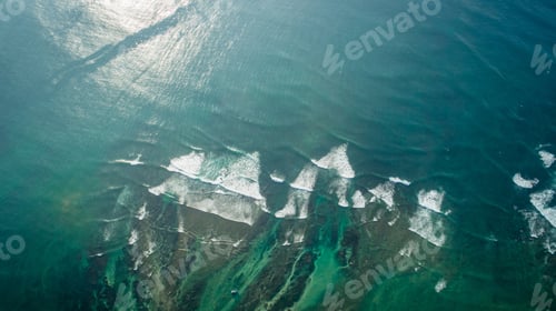 Preview: Aerial view of sea wave breaking in the coast