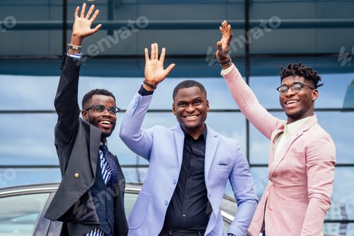 Preview: a group of their three successful African American businessmen in a stylish suit talking