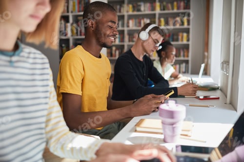 Preview: Group of Students in Library Side View