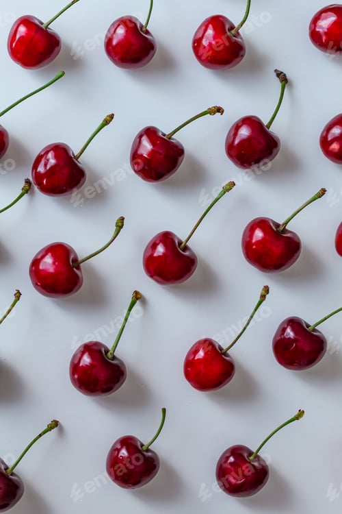 Preview: Layout, pattern of red cherry berries on a white background