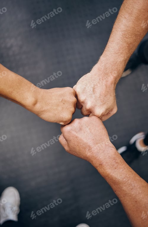 Preview: Hands, motivation and collaboration with people in the gym from above for health, fitness or solida